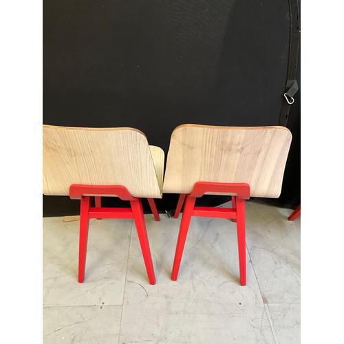 454 - SEVEN  WOODEN CAFE CHAIRS WITH RED PAINTED LEGS