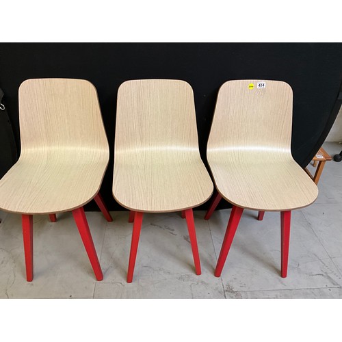 454 - SEVEN  WOODEN CAFE CHAIRS WITH RED PAINTED LEGS