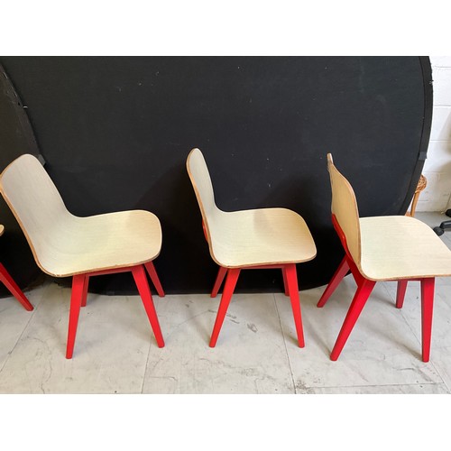 454 - SEVEN  WOODEN CAFE CHAIRS WITH RED PAINTED LEGS