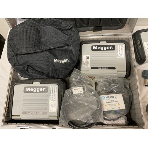 23 - CASE CONTAINING VARIOUS MEGGER ELECTRICAL TESTERS TO INCLUDE LOOP TESTER,INSULATION TESTER AND RCD T... 