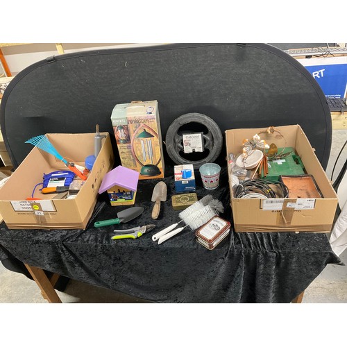 31 - TWO BOXES OF ODDS TO INCLUDE BUTTERFLY HOUSE,WIND CHIMES, GARDENING TOOLS ETC