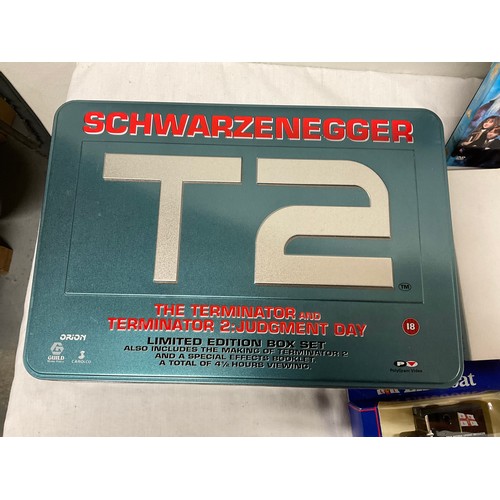 36 - BOX CONTAINING NUMBER OF BOXED TOY CARS,VIDEOS,DVDS TO INCLUDE TERMINATOR 2 BOXED SET