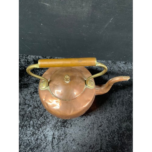 56 - TWO VINTAGE COPPER KETTLES EACH WITH BRASS FINNEAL HANDLES