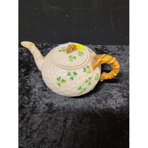 89 - BELLEEK TEAPOT AND MILK JUG