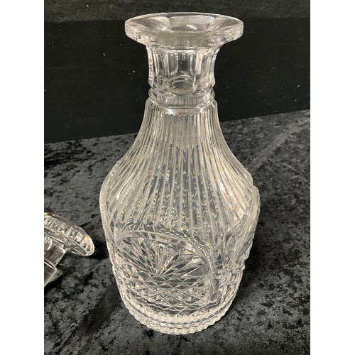 94 - FOUR CUT GLASS DECANTERS ONE WITH SILVER TOP