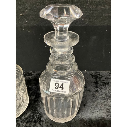 94 - FOUR CUT GLASS DECANTERS ONE WITH SILVER TOP