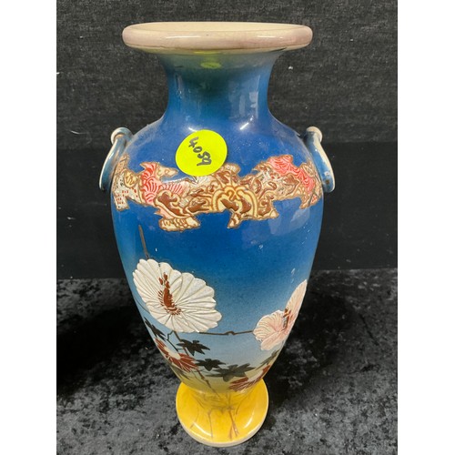 99 - PAIR OF ORIENTAL STYLE VASES DECORATED WITH FLOWERS H12