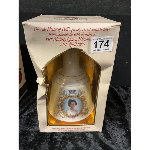 174 - TWO BOXED COMMERATIVE WEIGHED BELLS ONE FOR HER MAJESTYS QUUEN ELIZABETH 60TH BIRTHDAY 1986 AND 1981... 