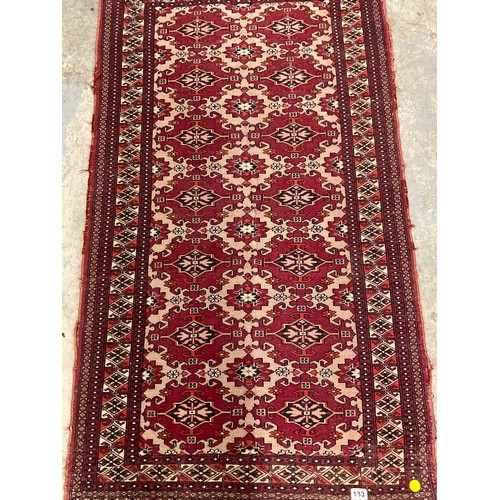 183 - VINTAGE WOVEN RED PATTERNED CARPET 70” X 36”