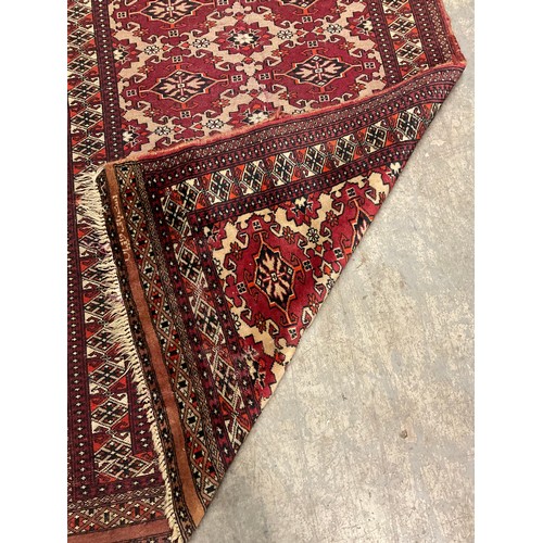 183 - VINTAGE WOVEN RED PATTERNED CARPET 70” X 36”