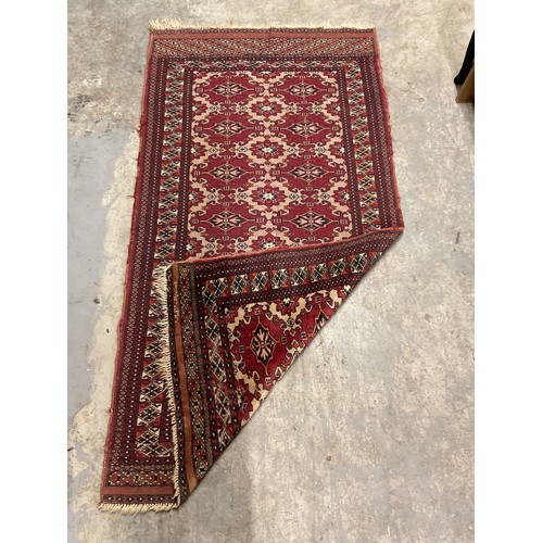 183 - VINTAGE WOVEN RED PATTERNED CARPET 70” X 36”