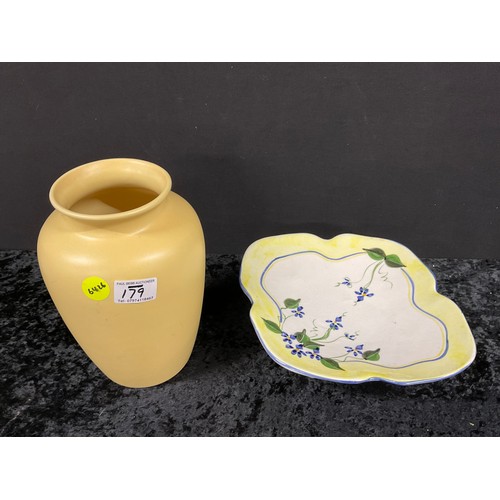 237 - YELLOW CERAMIC GLAZED FLOWER VASE AND A HAND PAINTED CERAMIC DISH MOUNTED ON FOUR FEET