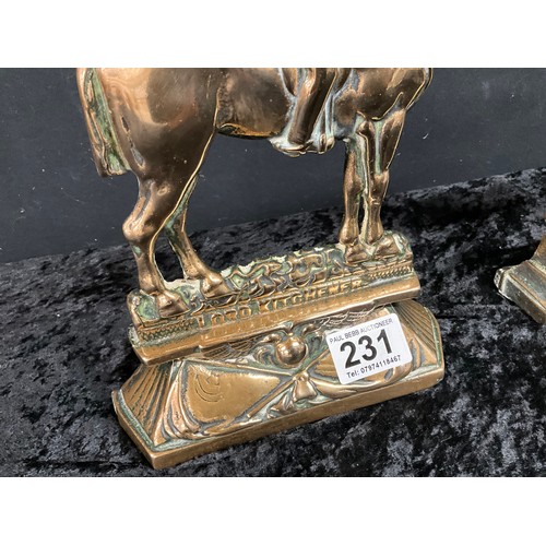 231 - PAIR OF MILITARY STYLE BRASS DOORSTOPS H10