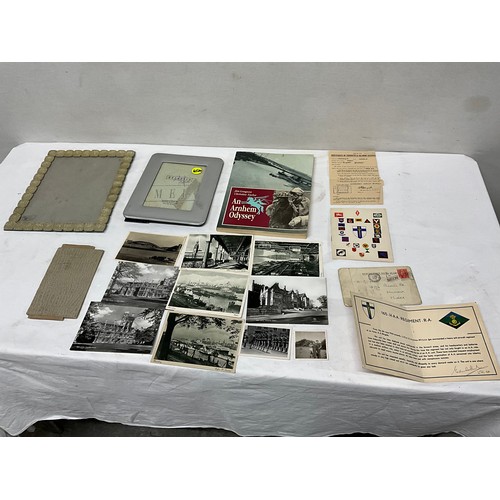 267 - TWO PHOTO FRAMES, A BOOK ON ARNHEM ODYSSEY, COLLECTION OF POSTCARDS MILITARY PAPERWORK ETC