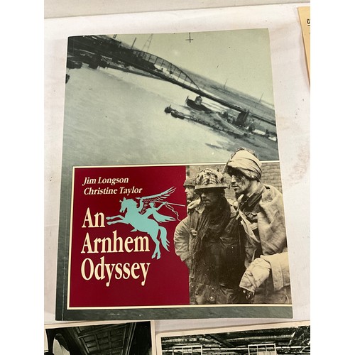 267 - TWO PHOTO FRAMES, A BOOK ON ARNHEM ODYSSEY, COLLECTION OF POSTCARDS MILITARY PAPERWORK ETC