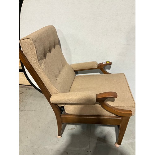 299 - UPHOLSTERED BEECH ARM CHAIR ON CASTERS