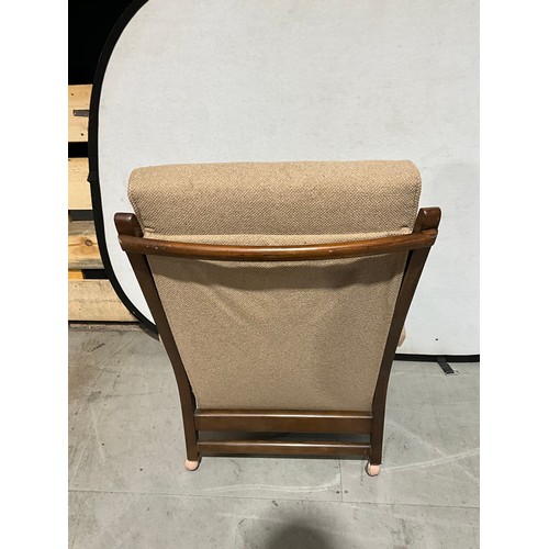 299 - UPHOLSTERED BEECH ARM CHAIR ON CASTERS