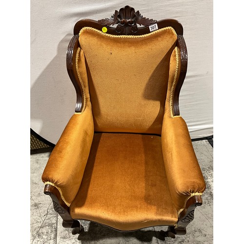 307 - EDWARDIAN UPHOLSTERED MAHOGANY ARM CHAIR ON CABRIOLE LEGS