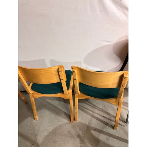 331 - SEVEN STACKING  BEECH CHAIRS WITH UPHOLSTERED SEATS