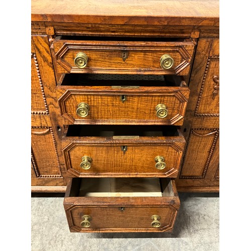 378 - VINTAGE OAK SIDEBOARD WITH FOUR CENTRAL DRAWERS AND CUPBOARDS TO EACH END W42