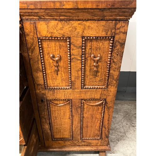 378 - VINTAGE OAK SIDEBOARD WITH FOUR CENTRAL DRAWERS AND CUPBOARDS TO EACH END W42