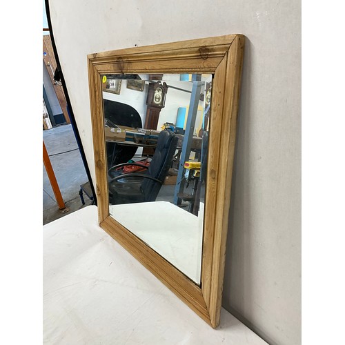 384 - PINE FRAMED BEVELLED EDGED WALL MIRROR 29