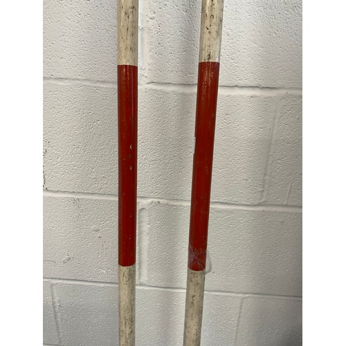 419 - TWO VINTAGE PAINTED SURVEYORS POLES