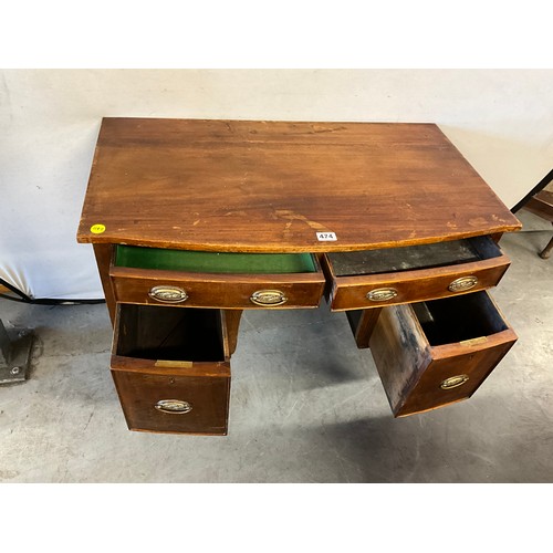 474 - EDWARDIAN MAHOGANY KNEE HOLE BOW FRONTED DESK OF SMALL PROPORTIONS WITH TWO DRAWERS OVER TWO DOORS O... 