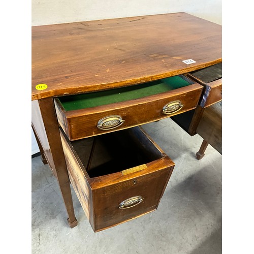 474 - EDWARDIAN MAHOGANY KNEE HOLE BOW FRONTED DESK OF SMALL PROPORTIONS WITH TWO DRAWERS OVER TWO DOORS O... 