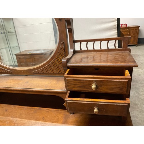 445 - EDWARDIAN OAK DRESSING TABLE WITH OVAL FRAMED MIRROR FLANKED BY TWO JEWELLERY DRAWERS OVER FOUR DRAW... 