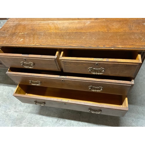 445 - EDWARDIAN OAK DRESSING TABLE WITH OVAL FRAMED MIRROR FLANKED BY TWO JEWELLERY DRAWERS OVER FOUR DRAW... 