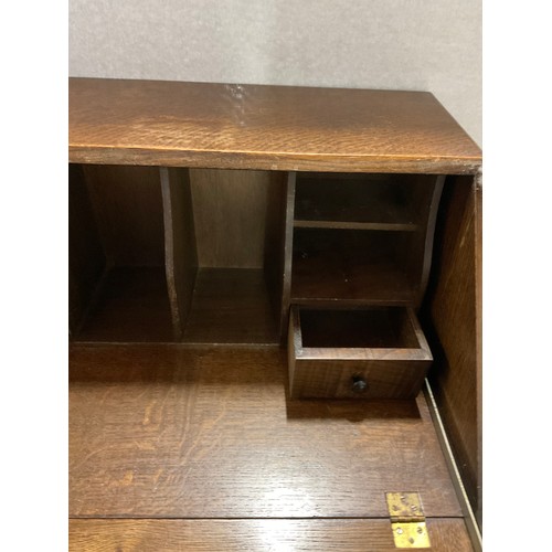 480 - VINTAGE PRIORY STYLE OAK BUREAU WITH FITTED INTERIOR OVER THREE DRAWERS COMPLETE WITH KEY H40