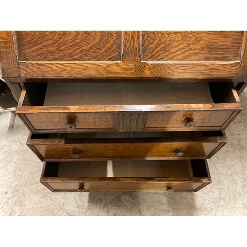 480 - VINTAGE PRIORY STYLE OAK BUREAU WITH FITTED INTERIOR OVER THREE DRAWERS COMPLETE WITH KEY H40