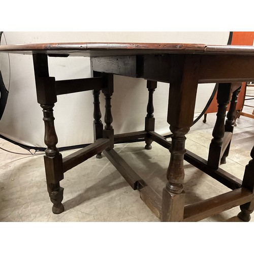 484 - PEG AND DOWEL SOLID OAK DROP LEAF GATELEG OVAL DINING TABLE H30