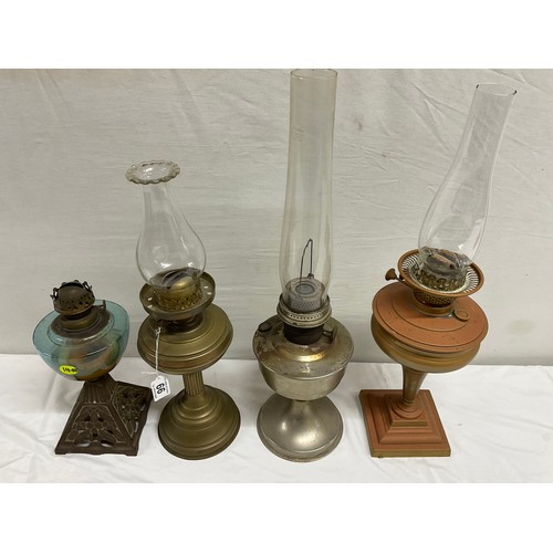 66 - VICTORIAN CAST IRON BASED OIL LAMP, 2 BRASS EXAMPLES AND ALADDIN LAMP