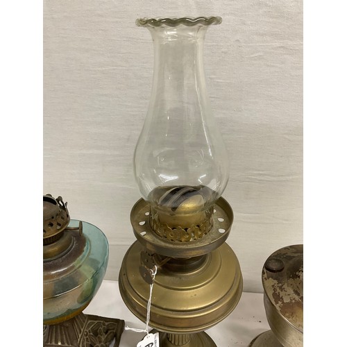 66 - VICTORIAN CAST IRON BASED OIL LAMP, 2 BRASS EXAMPLES AND ALADDIN LAMP