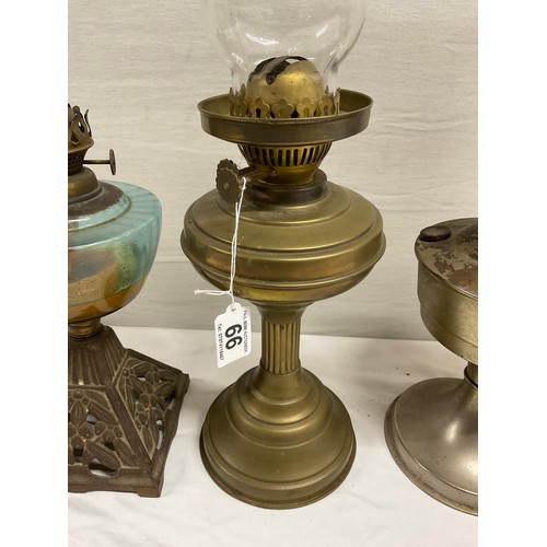 66 - VICTORIAN CAST IRON BASED OIL LAMP, 2 BRASS EXAMPLES AND ALADDIN LAMP