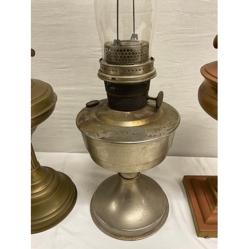 66 - VICTORIAN CAST IRON BASED OIL LAMP, 2 BRASS EXAMPLES AND ALADDIN LAMP