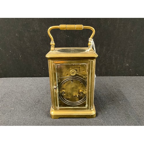 95 - VINTAGE BRASS CARRIAGE CLOCK WITH BEVELLED GLASS WITH CARRYING HANDLE