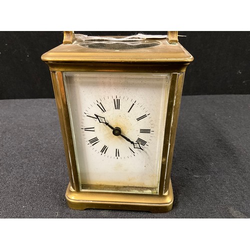 95 - VINTAGE BRASS CARRIAGE CLOCK WITH BEVELLED GLASS WITH CARRYING HANDLE