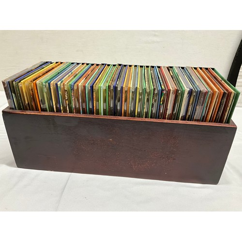 102 - SMALL BOOKSHELF WITH 32 MOZART BOOKS