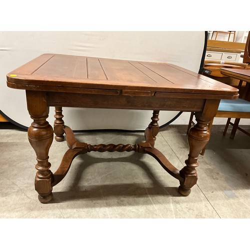 434 - VINTAGE OAK DRAWER LEAF DINING TABLE ON TURNED AND STRETCHERED BASE H29