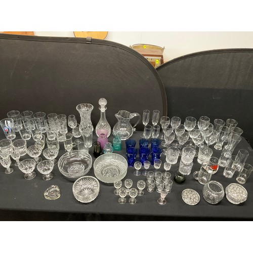 20A - THREE BOXES OF GLASSWARE TO INCLUDE DECANTERS, FRUIT BOWLS, VASES, WATER JUGS, DRINKING GLASSES ETC