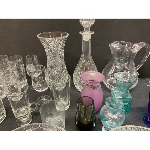 20A - THREE BOXES OF GLASSWARE TO INCLUDE DECANTERS, FRUIT BOWLS, VASES, WATER JUGS, DRINKING GLASSES ETC