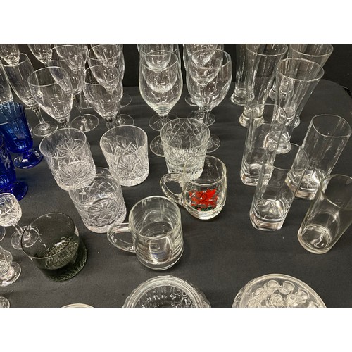 20A - THREE BOXES OF GLASSWARE TO INCLUDE DECANTERS, FRUIT BOWLS, VASES, WATER JUGS, DRINKING GLASSES ETC