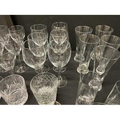 20A - THREE BOXES OF GLASSWARE TO INCLUDE DECANTERS, FRUIT BOWLS, VASES, WATER JUGS, DRINKING GLASSES ETC