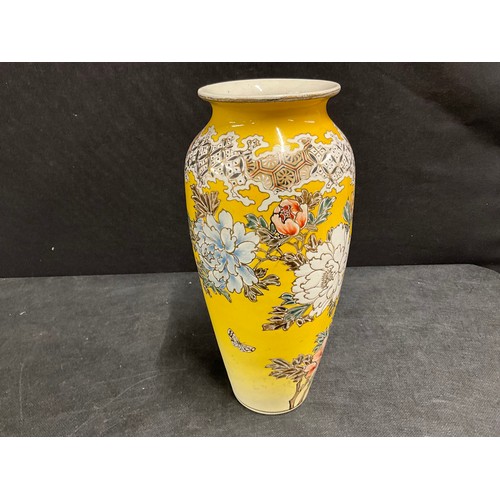 62 - ORIENTAL HAND PAINTED VASE DECORATED WITH FLOWERS