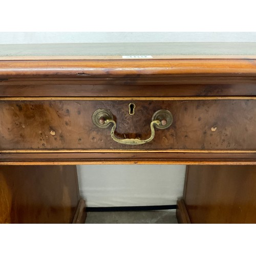 369 - REPRODUCTION YEW WOOD KNEEHOLE TWIN PEDESTAL DESK WITH LEATHER INSET TOP AND NINE DRAWERS H30