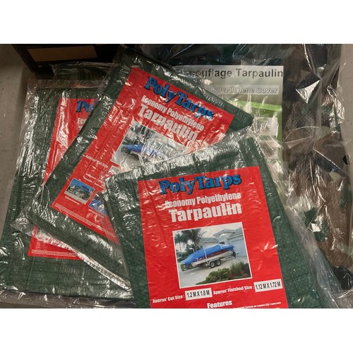 19 - A BOX OF NEW CAMOFLAUGE TARPAULIN SHEETS