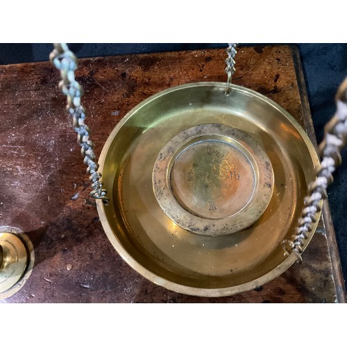 41 - VICTORIAN BRASS BALANCE SCALES AND WEIGHTS ON MAHOGANY PLINTH